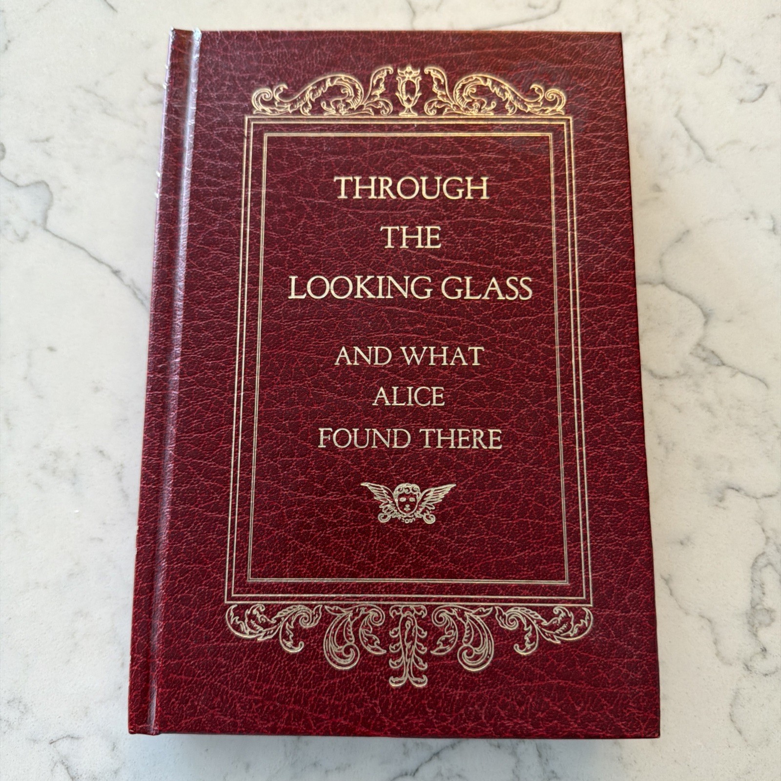 Through the Looking Glass: And What Alice Found There by Lewis Carroll Hardcover